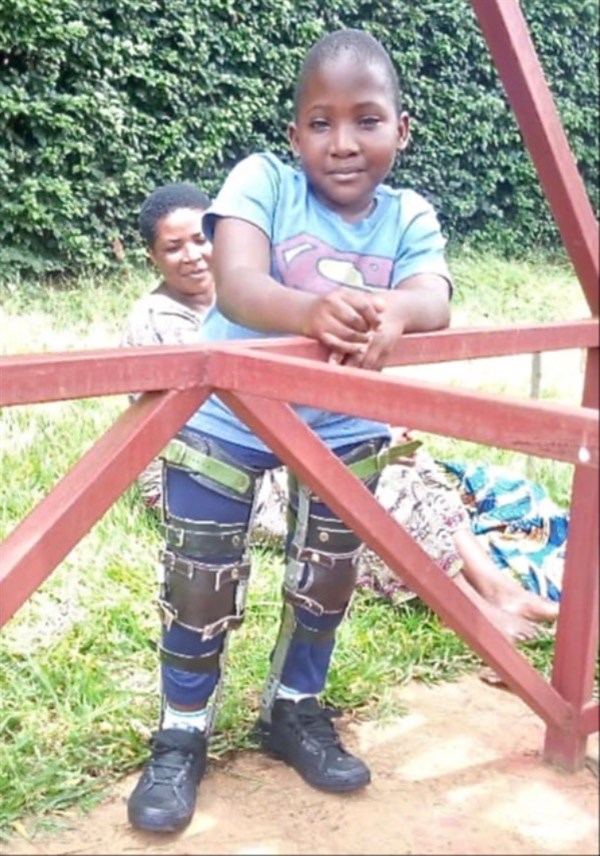 Joshua, the son of Pastor Evariste and his wife Venerande, with his new leg braces which will enable him to be more independent. Paid for by DT SAP Help Fund. Thank you!