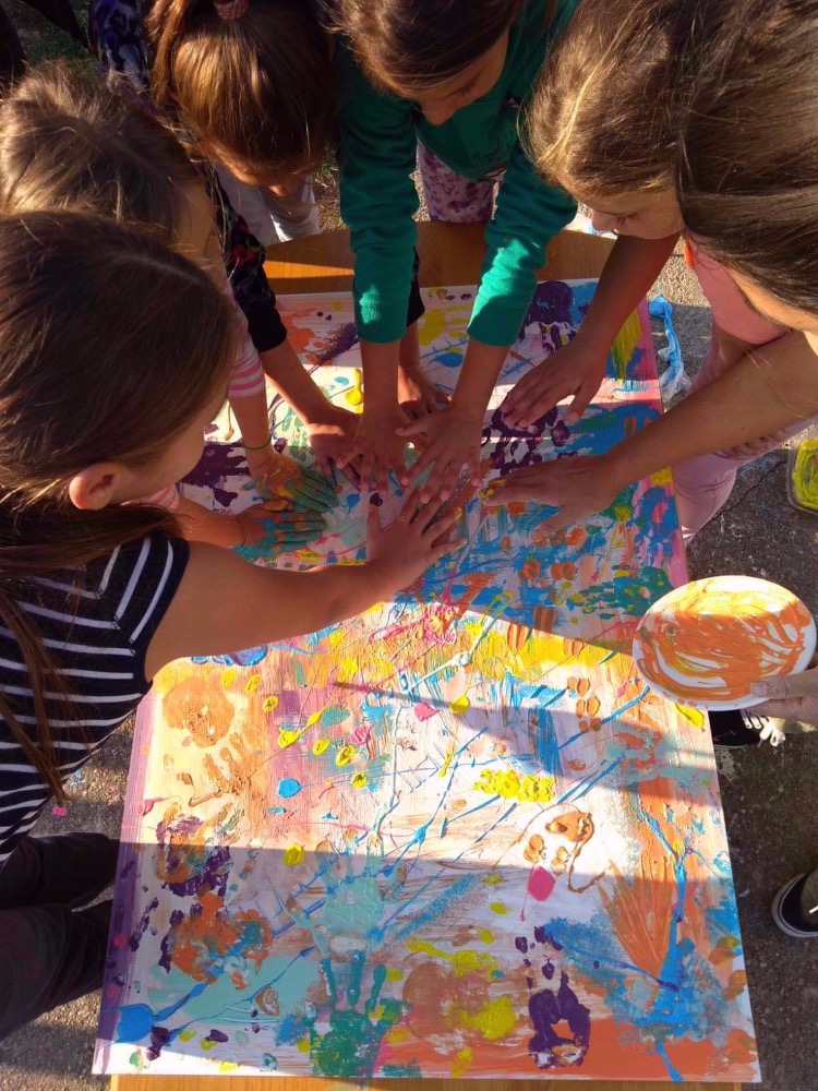 Hand prints by children for ACV office